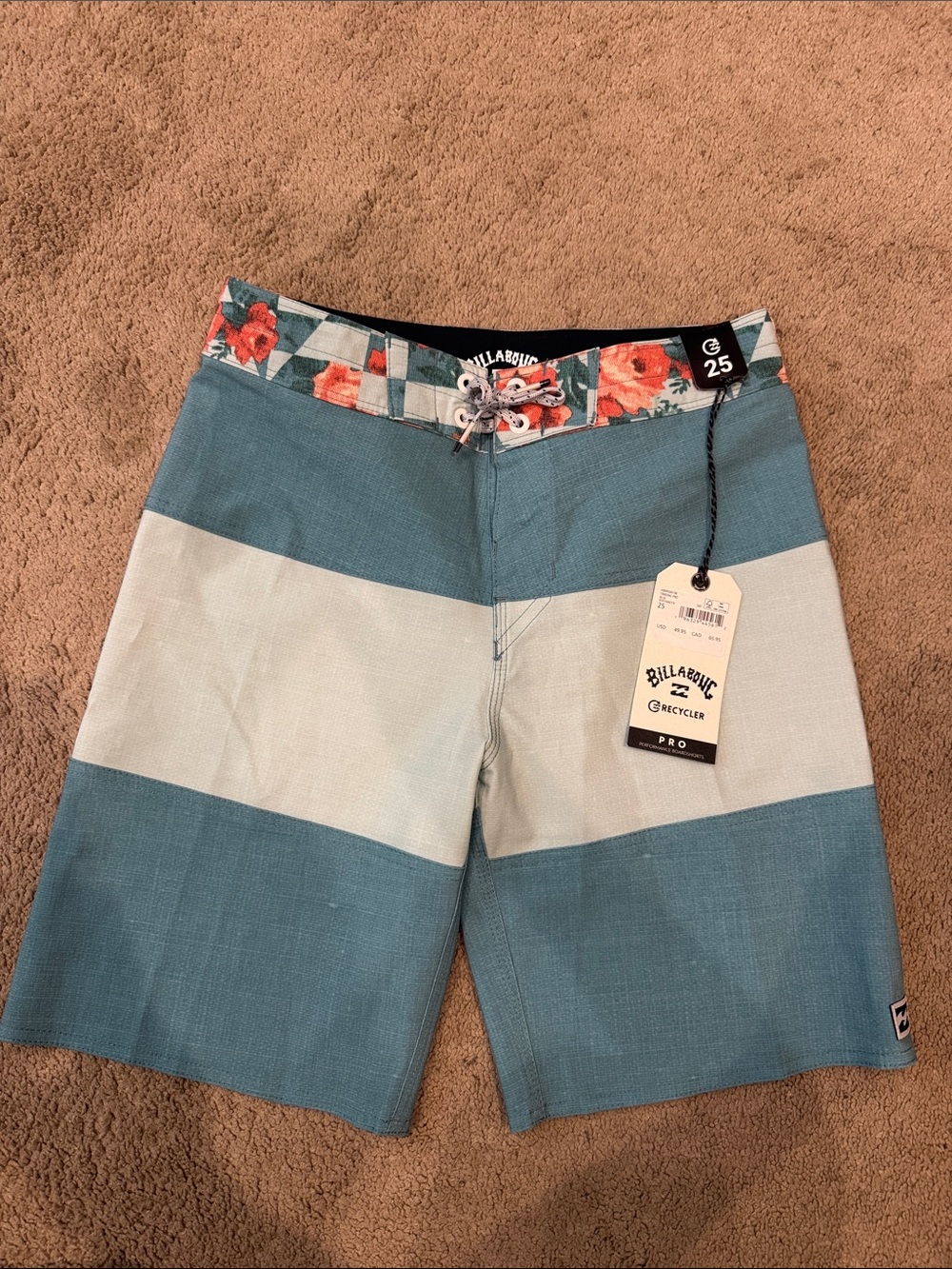 Boys size 25(10) Billabong Teal & Blue Stripe Boardshorts with Floral Waistband